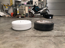 Load image into Gallery viewer, EPS Tesla Roadster wheel next to a real wheel 1.