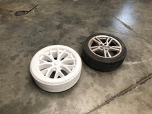 Load image into Gallery viewer, EPS Tesla Roadster wheel next to a real wheel 2.
